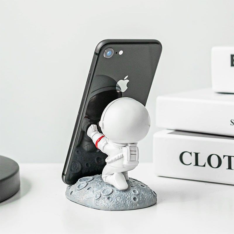 Soporte para móvil de 4 a 7 pulgadas con diseño de astronauta